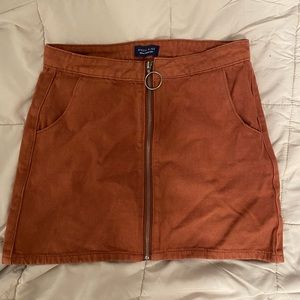 Burnt orange front zipper denim skirt